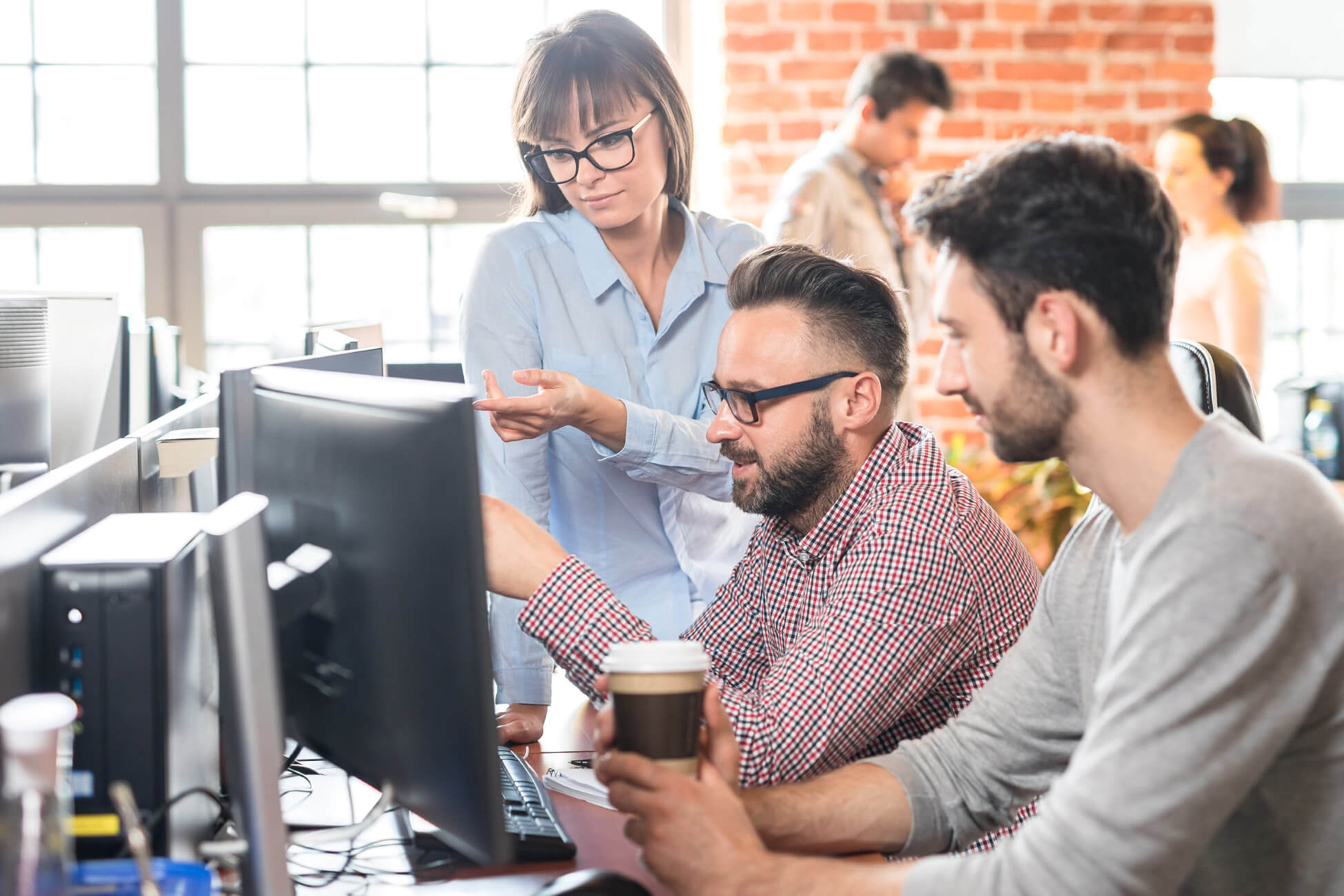 Web maintenance and support team collaborating for client support | Web Maintenance Agency